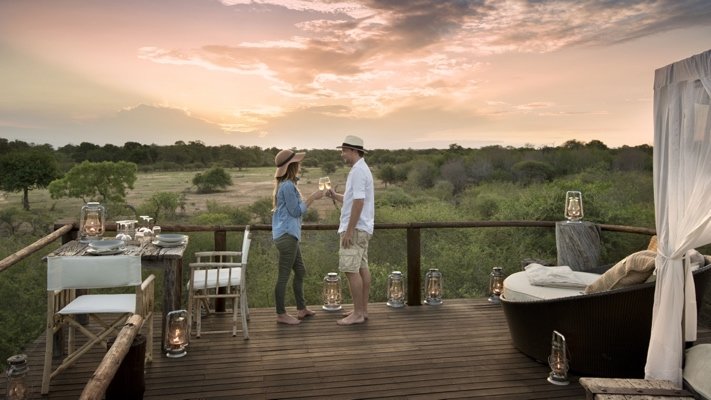 A couple celebrates in a Lion Sands tree house in South Africa