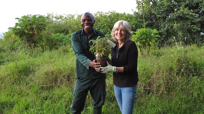 Lucille planting trees in Rwanda