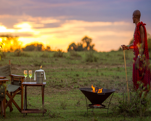Tipilikwani Mara Camp, sundowner in the African bush.