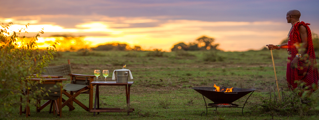 Tipilikwani Mara Camp, Sundowner in the african bush.